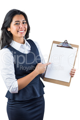 Smiling woman holding a clipboard