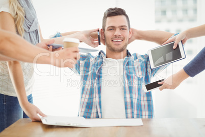 Portrait of smiling man with hands behind head Portrait of smiling man with hands behind head