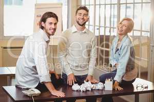 Smiling business people in meeting room