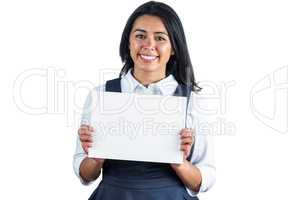 Happy woman holding a white sheet of paper