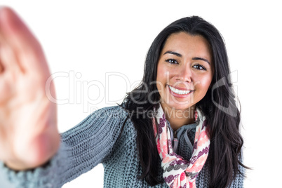 Smiling woman about to take a selfie