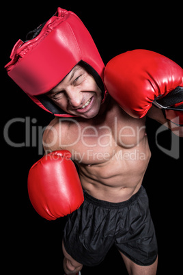 High angle view of boxer with headgear and gloves