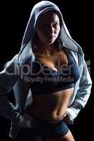 Portrait of sexy athlete in hood