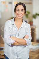 Portrait of businesswoman standing in office