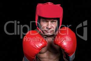 Portrait of boxer with gloves and headgear
