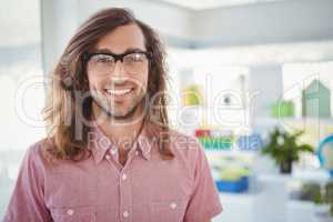 Happy hipster wearing eye glasses