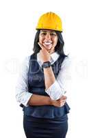 Smiling architect wearing her safety hat