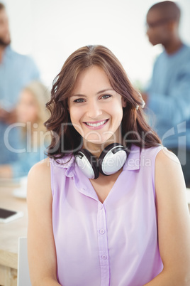 Portrait of smiling woman with headphones