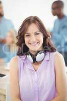 Portrait of smiling woman with headphones