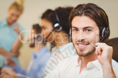 Male employee working in call center