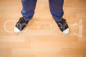 Man standing on hardwood floor