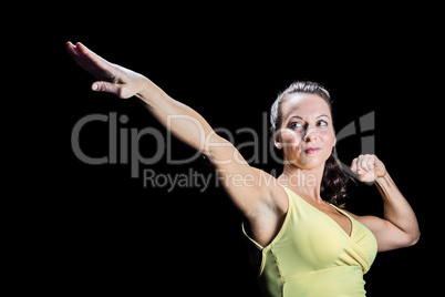 Beautiful confident athlete stretching hands Beautiful confident athlete stretching hands