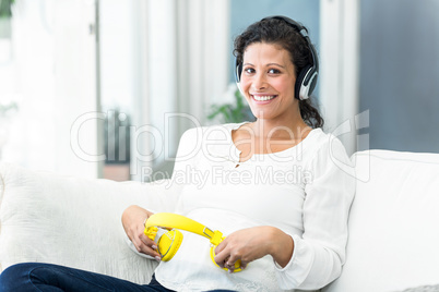 Portrait of happy woman with headphones