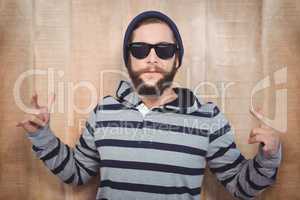 Hipster showing rock and roll hand sign