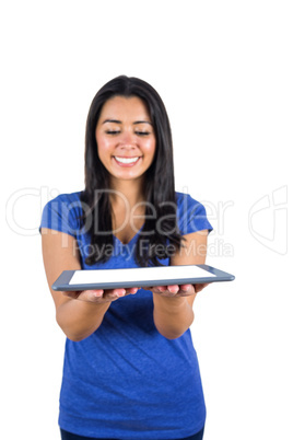 Cute woman holding a tablet pc in her hands