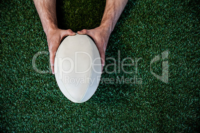 Man holding rugby ball