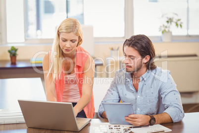 Business people looking at documents