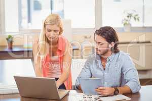 Business people looking at documents