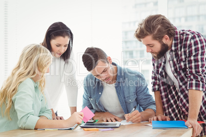 Man working with coworkers