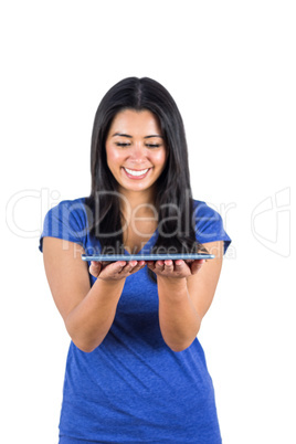 Cute woman holding a tablet pc in her hands