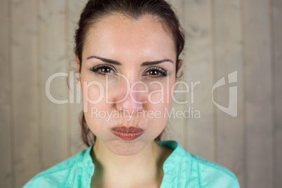 Portrait of beautiful woman making face
