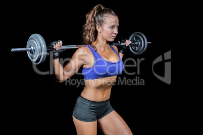 Confident woman lifting crossfit
