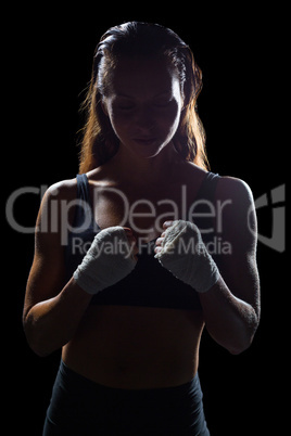 Female fighter with bandage