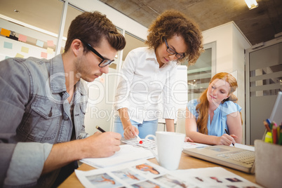 Business people looking at documents