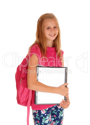 Happy schoolgirl ready for school.