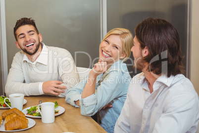 Business people enjoying brunch in canteen