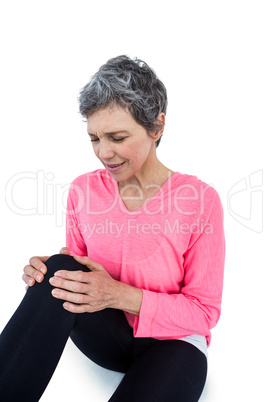 Mature woman suffering from knee pain