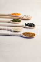 Wooden spoons of pulses and seeds