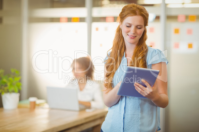 Businesswoman using digital PC