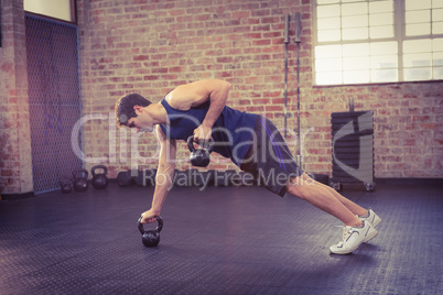 Man lifting kettlebell