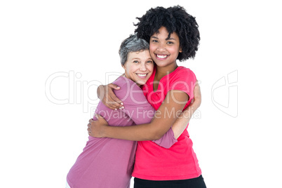 Portrait of happy daughter hugging mother