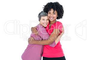 Portrait of happy daughter hugging mother