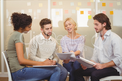 Business people with documents in meeting