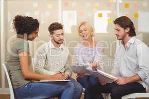 Business people with documents in meeting