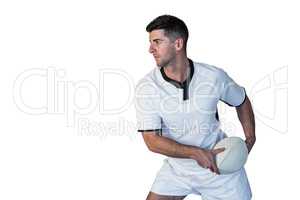 Rugby player holding the ball aside