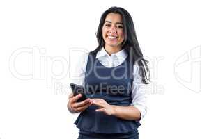 Smiling woman using her smartphone