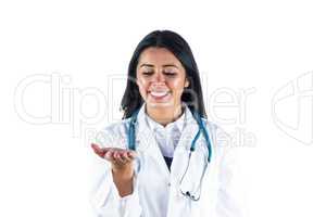 Smiling doctor holding her hand out