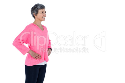 Mature woman with hand on hip