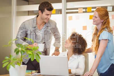 Business people taking coffee breakin office