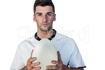 Portrait of a rugby player holding ball