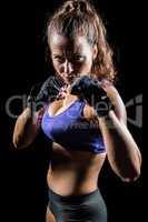 Portrait of woman with fighting stance