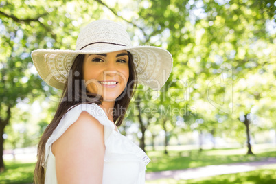 Portrait of happy woman in hat