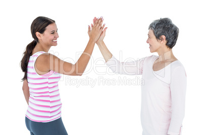 Happy women high fiving