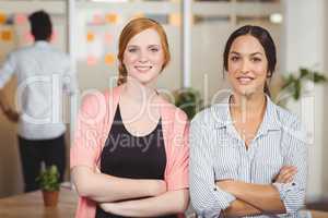 Portrait of businesswomen standing in office