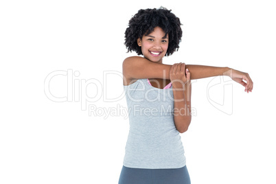Portrait of cheerful woman exercising
