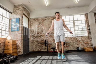 Low angle view of man doing skipping